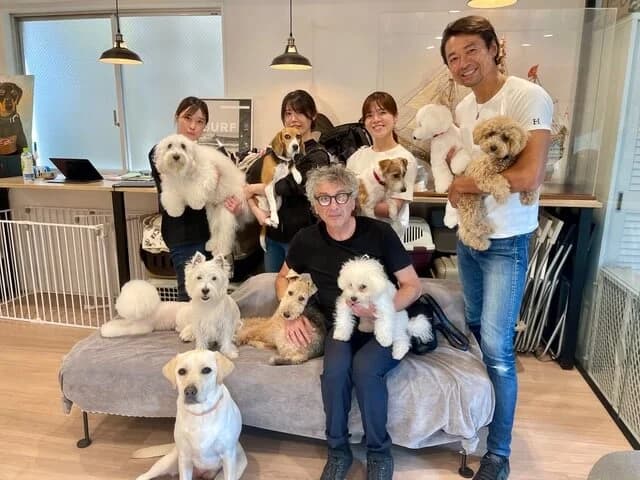 Happy breeder with a healthy dog